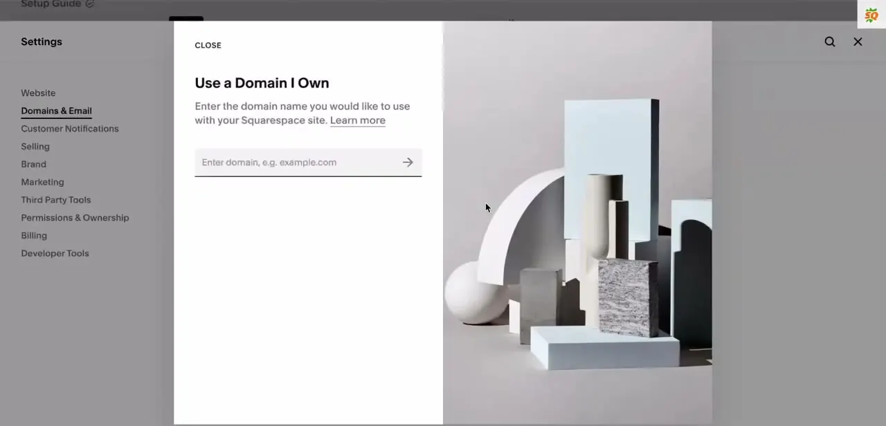 Squarespace's "Use a Domain I Own" dialog, where you type in the domain name you already registered elsewhere.