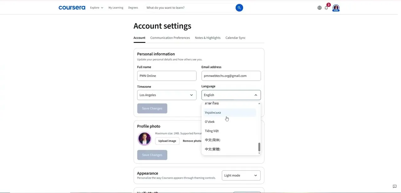 The Account settings page with the Language dropdown open — this is the setting that changes your interface language permanently, alongside timezone and profile details.