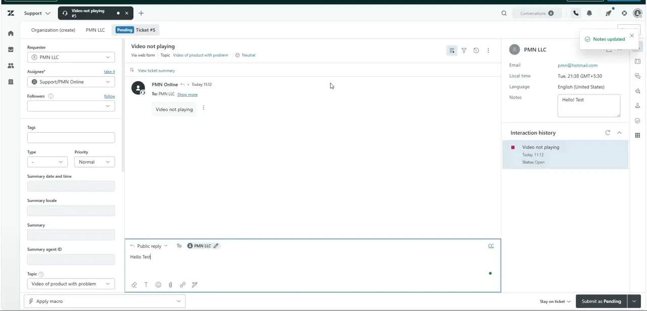 The reply composer with a draft public reply typed in, and a team-only note already saved to the customer notes field on the right.
