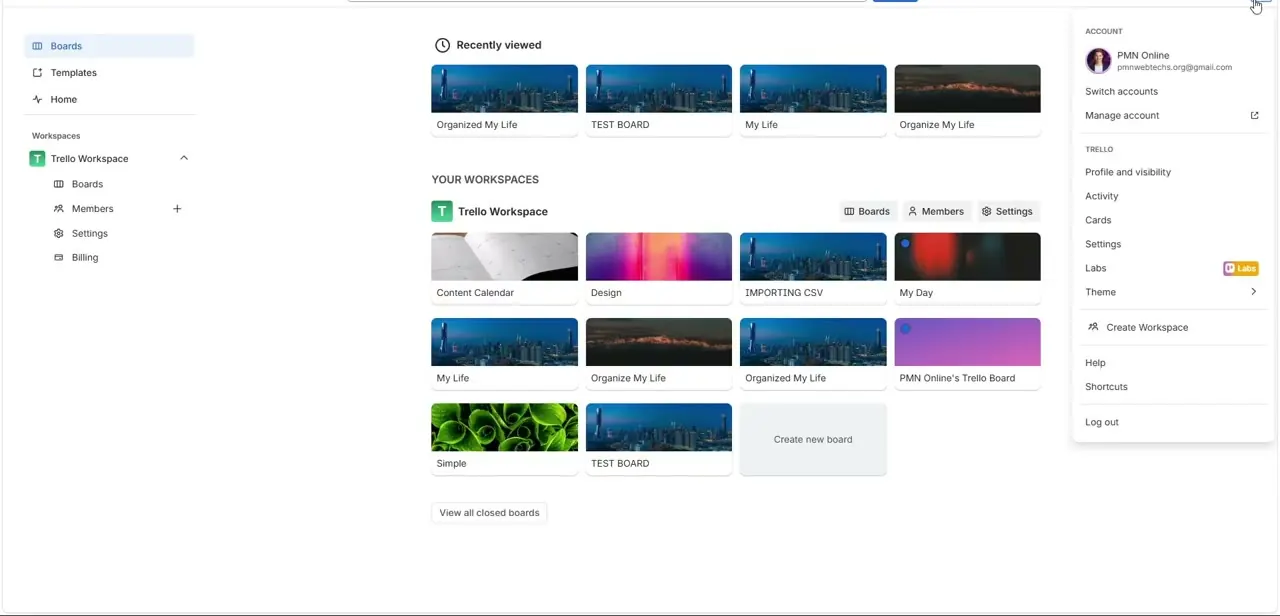 The account menu opened from the top-right avatar, listing Profile and visibility, Activity, Cards, Settings, and Labs.